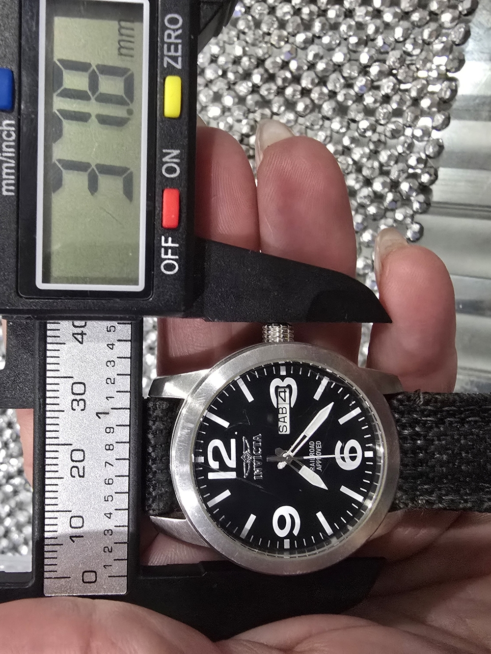 Invicta Men's Black Dial Watch with Silver Case and Black Canvas Strap